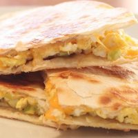Scrambled Egg Quesadillas for Breakfast or any time. #ScrambledEggQuesadilla #BreakfastQuesadilla #QuckBreakfast #EasyBreakfast #EggQuesadillaRecipe #RecipesAndMe